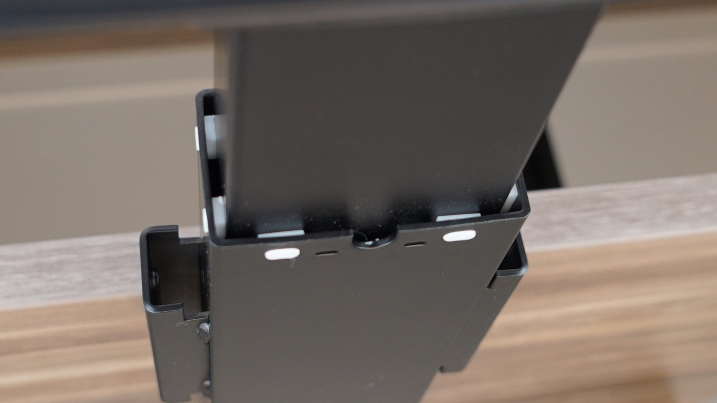 Close-up of BenchBUD adjustable height leg column to show the custom fit Derlin Acetyl Column Glides. The glides are used for smooth height adjustment and column stability.